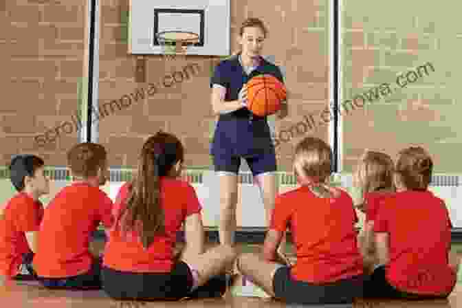 Youth Basketball Coach Instructing Young Players On The Court Coaching Youth Basketball: A Concise And Practical Guide